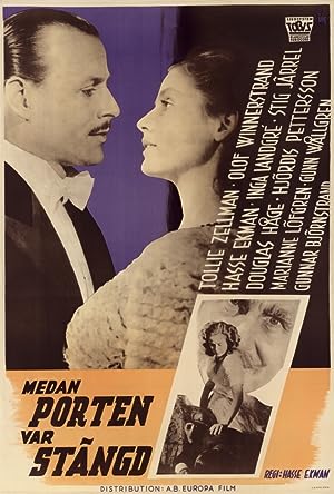 Cover image of the movie Medan porten var stängd (1946)