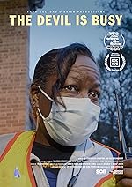 Cover image of the movie The Devil Is Busy